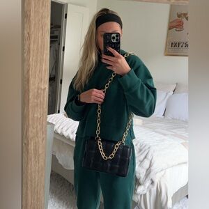 Black, gold chain purse